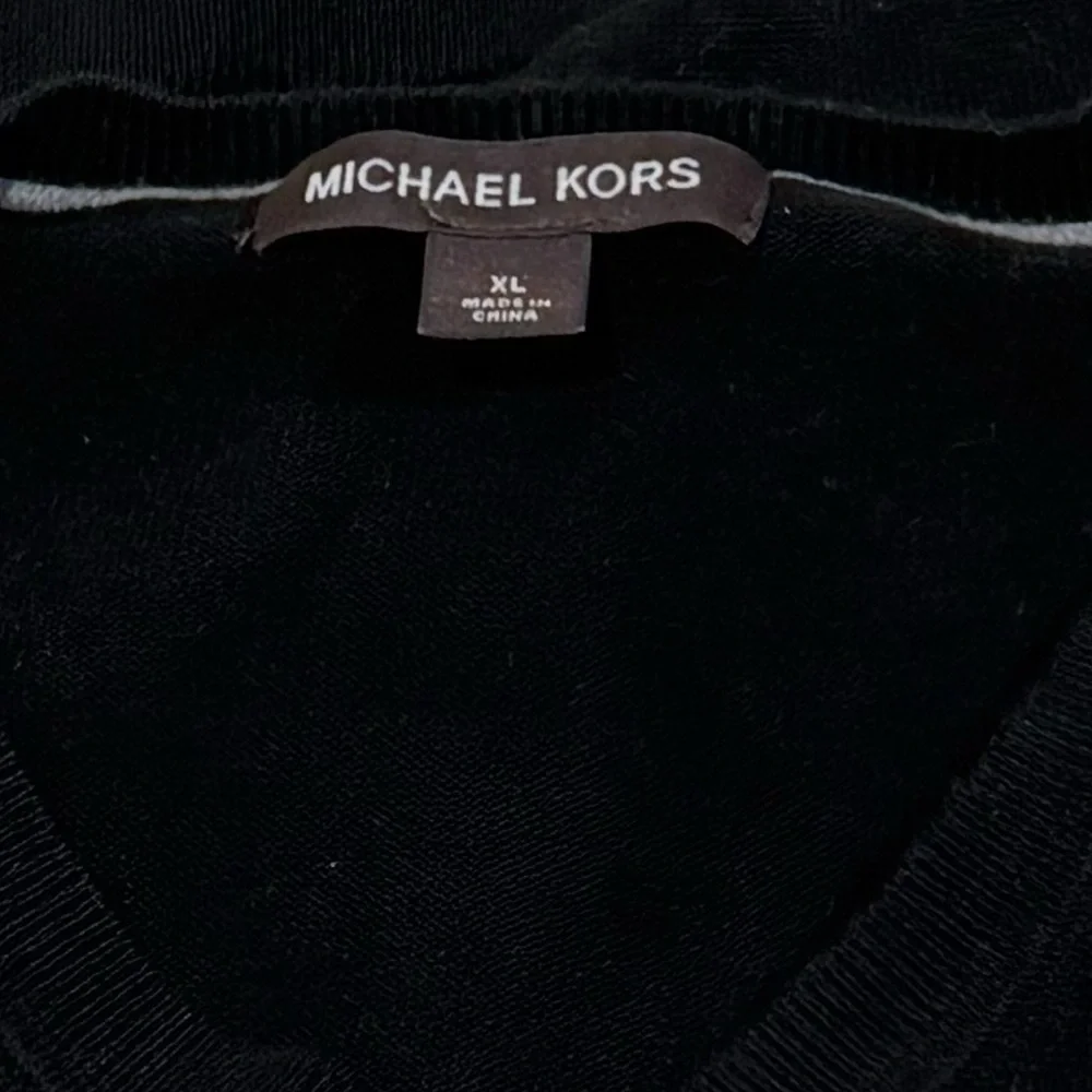 Michael Kors Men's Classic Black V-Neck Sweater material tag cut out